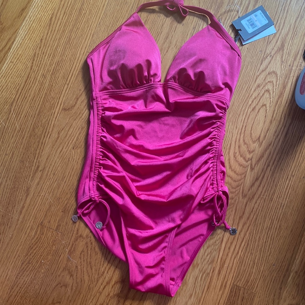 Dark pink DKNY one piece halter swimsuit. New with tags. Size 6
